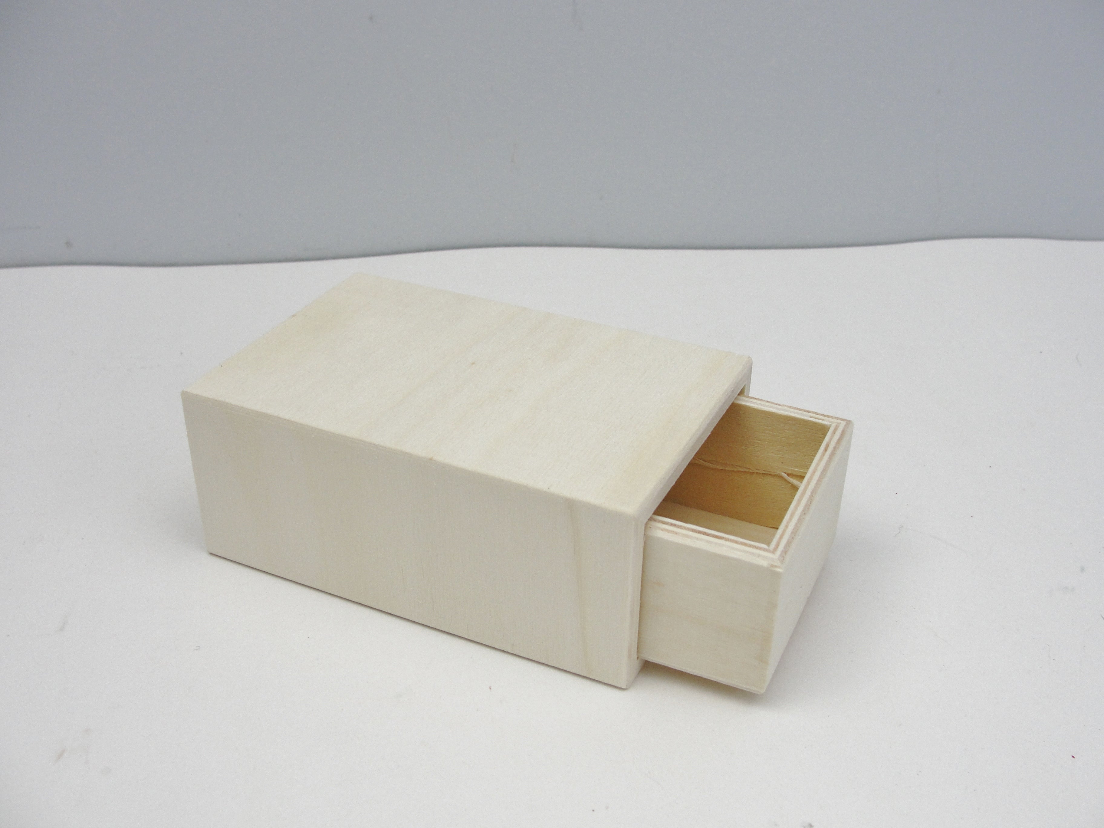 small unfinished wood boxes