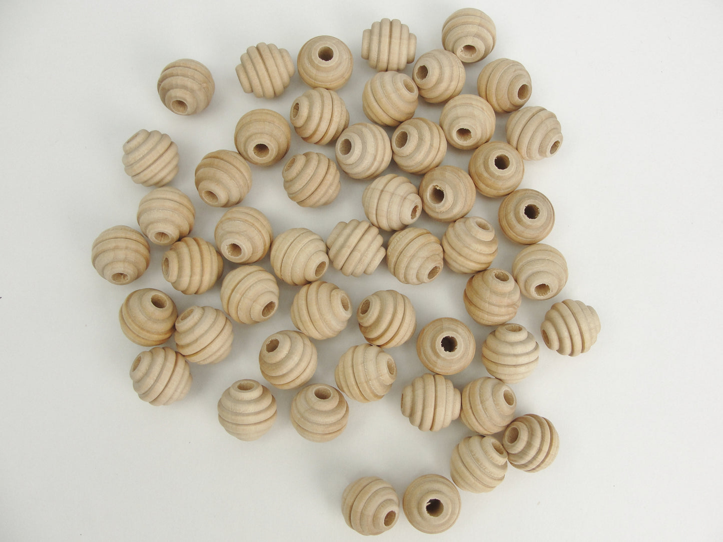 Wood beehive beads 5/8" with a 3/16" hole - Wood parts - Craft Supply House