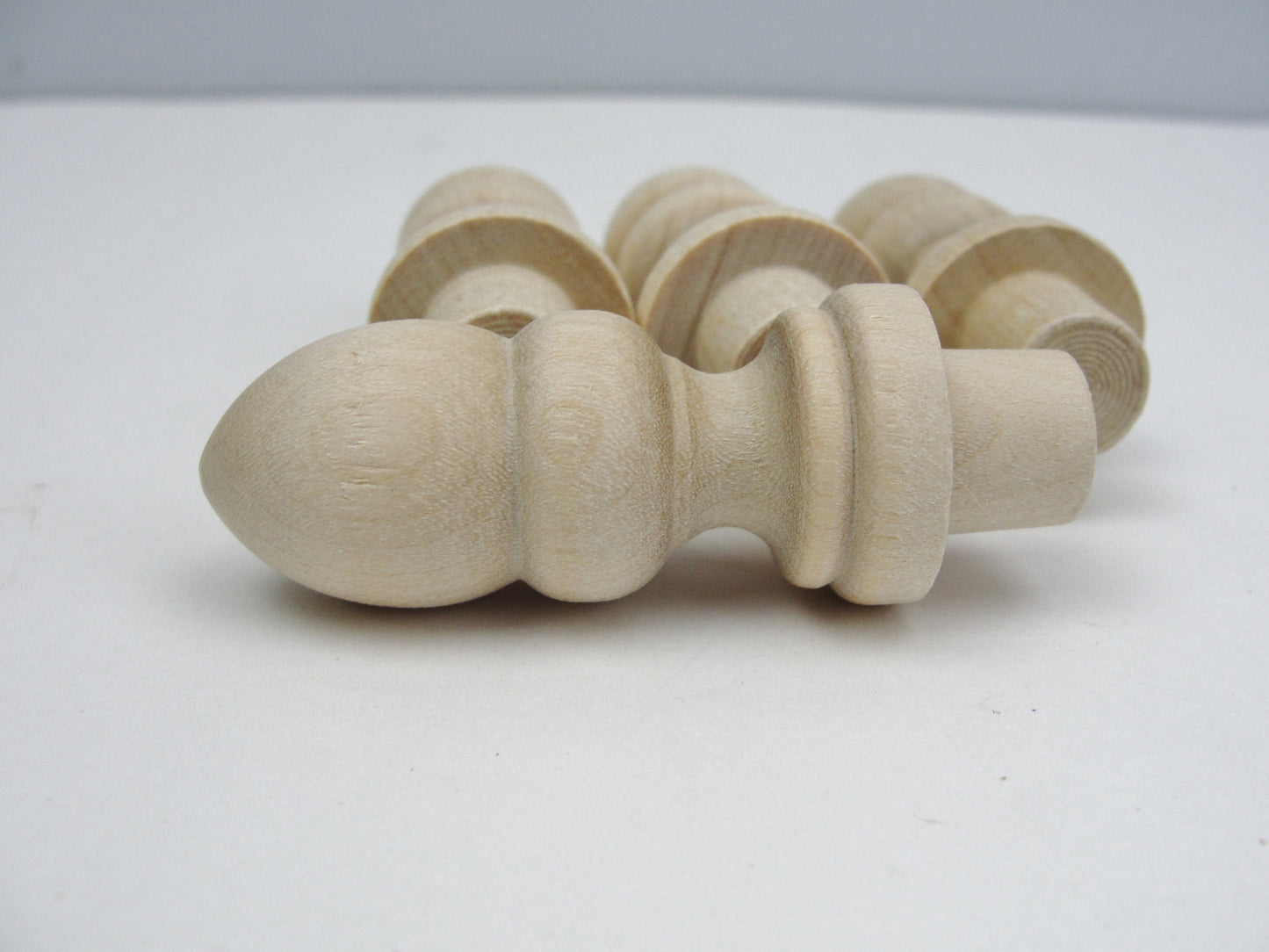 Small wooden acorn top finial set of 4