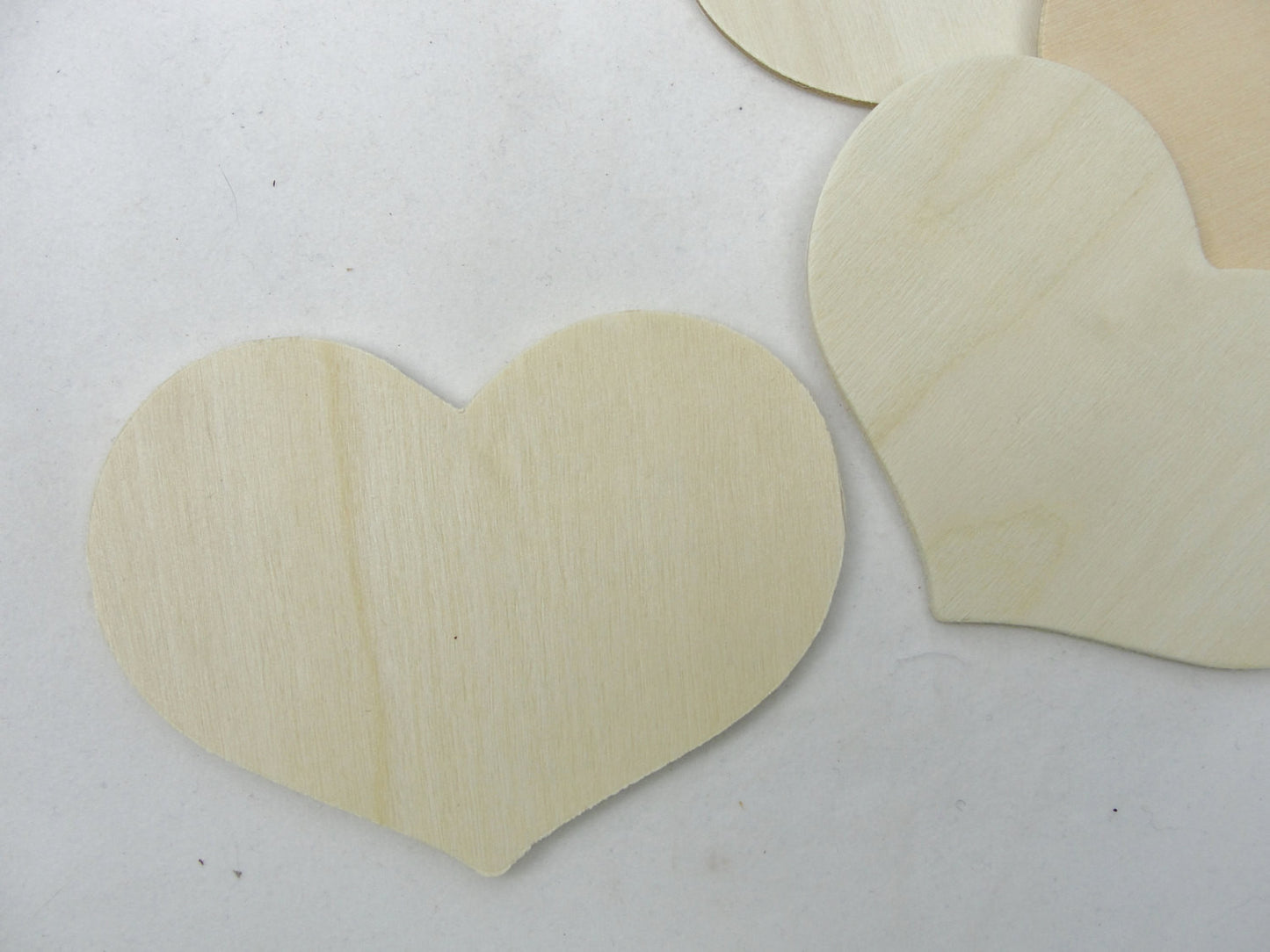 5 wooden country hearts 3 3/8" wide 2 1/2" tall 1/8" thick unfinished - Wood parts - Craft Supply House